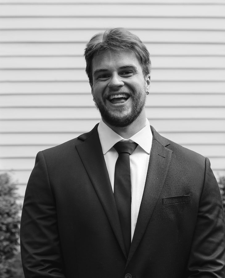 Gabe Allen — founder of Given, smiling in a dark jacket